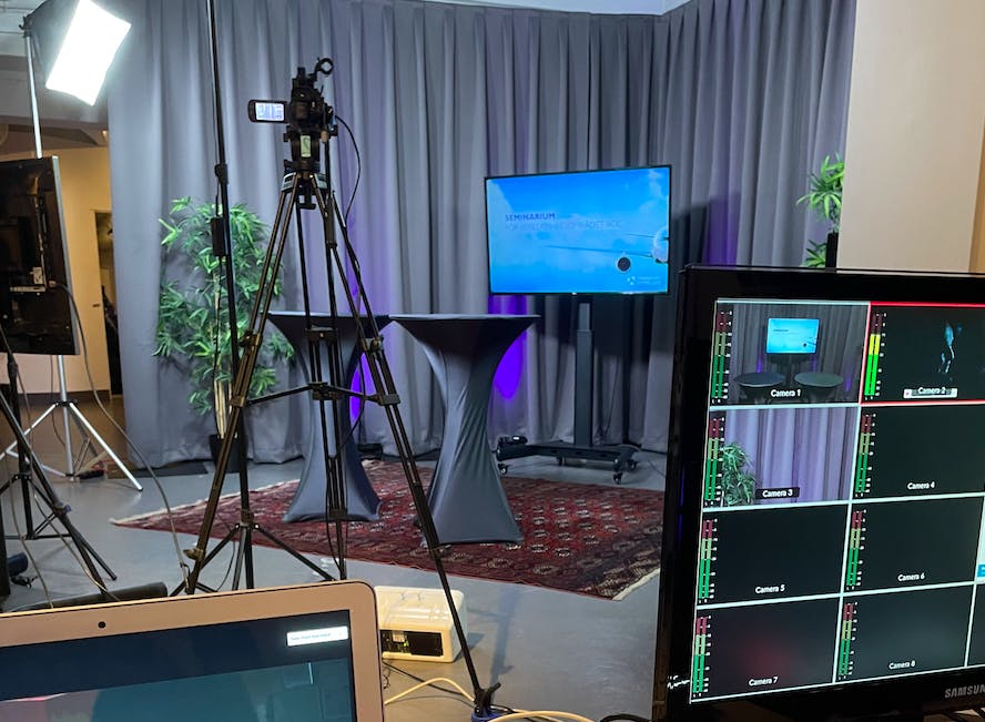 Streaming Studio at IVA Conference Centre with sleek screen for virtual events.