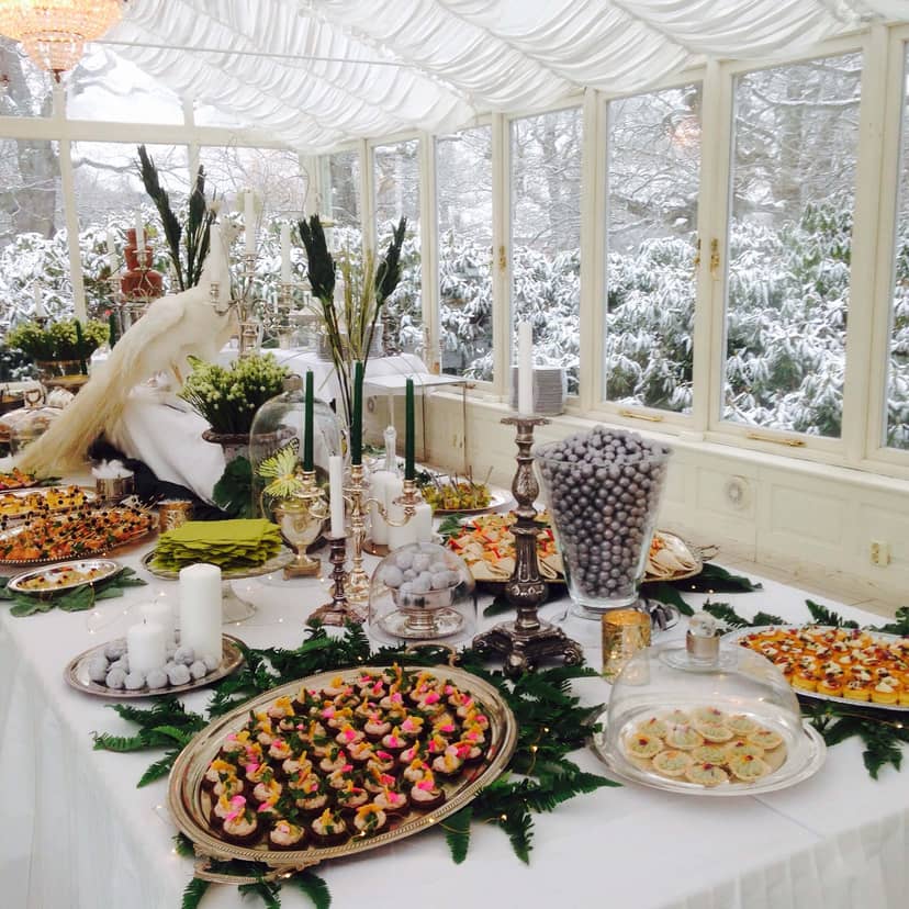 Elegant buffet table at Rosendals Wärdshus for a winter gala event.