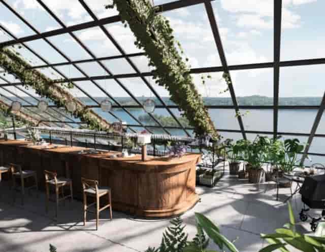 Bistro at Rosendals Wärdshus: elegant glass venue for events with panoramic water views.