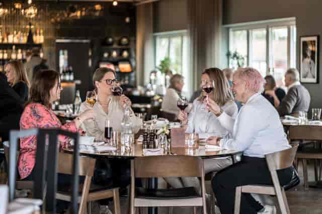 Vibrant dining setting at Kvarnbacken, ideal for corporate events and networking.