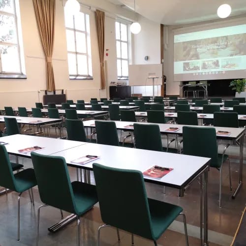 Conference center at Hotell Kristina, organized meeting space for workshops and networking.