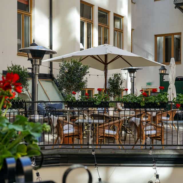 Charming outdoor event space at Le Garden, The Sparrow Hotel, ideal for gatherings.