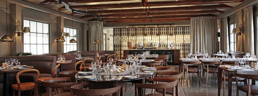 Elegant dining space at Stallmästaregården for upscale events and corporate dinners.