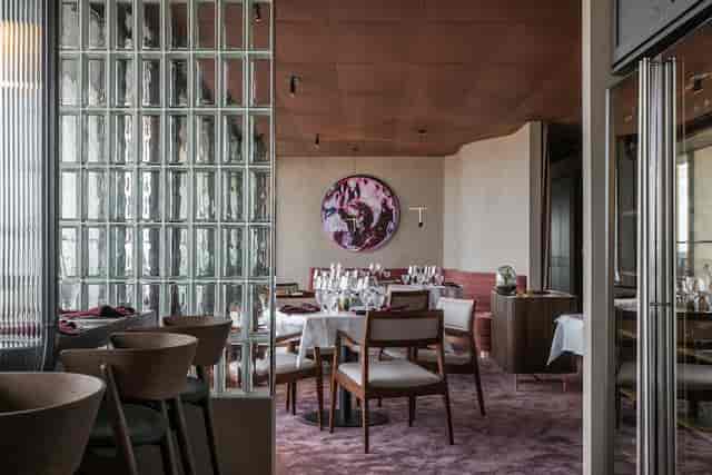 Elegant dining space in La Tour Chambre Séparée for corporate dinners and private events.