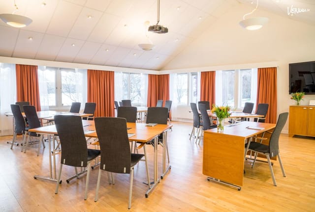 Steningevik Conference Facility meeting room with natural light, ideal for workshops.