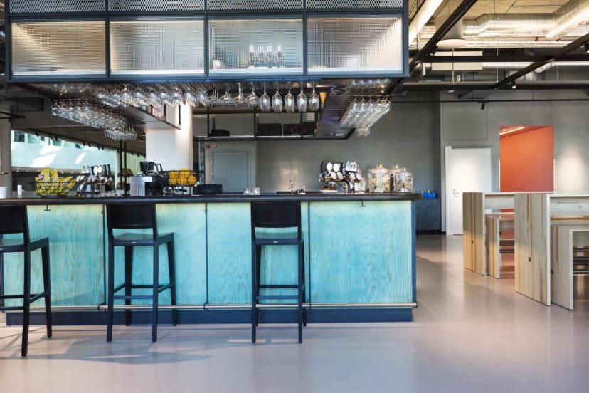 Modern bar area in Proviant Albano, perfect for networking events and casual gatherings.
