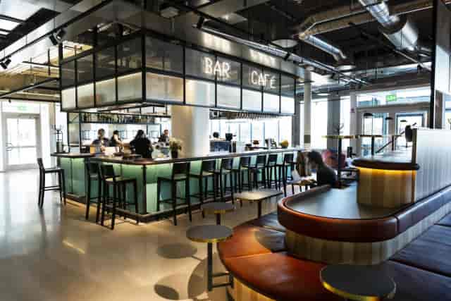 Modern bar and café in Proviant Albano, ideal for networking events and casual meetings.