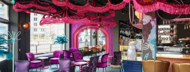 Heurlins restaurant event space with vibrant decor, ideal for creative gatherings and meetings.