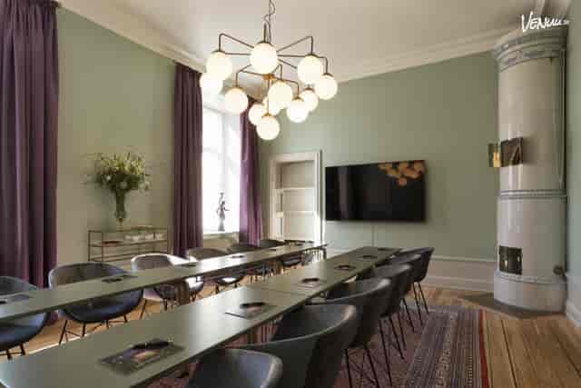 Stylish conference room at Näsby Slott with modern decor for meetings and events.