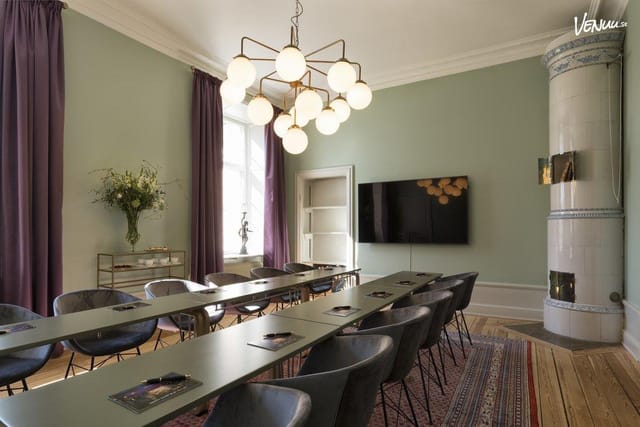 Stylish conference room at Näsby Slott with modern decor for meetings and events.