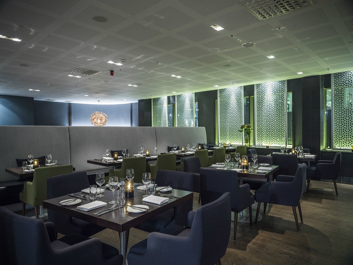 Sophisticated dining space at Event Area Bar 5, ideal for corporate events and gatherings.