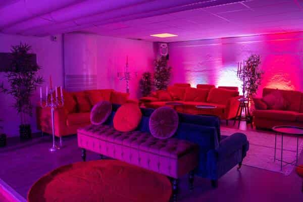 Stylish lounge area with plush seating, perfect for events and networking.
