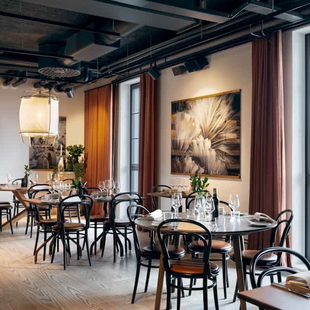 Elegant event space at The Winery Hotel with stylish decor for upscale dining and gatherings.