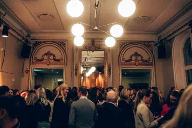 Vibrant networking event at Kristallen, Södra Teatern with stylish decor and lively crowd.
