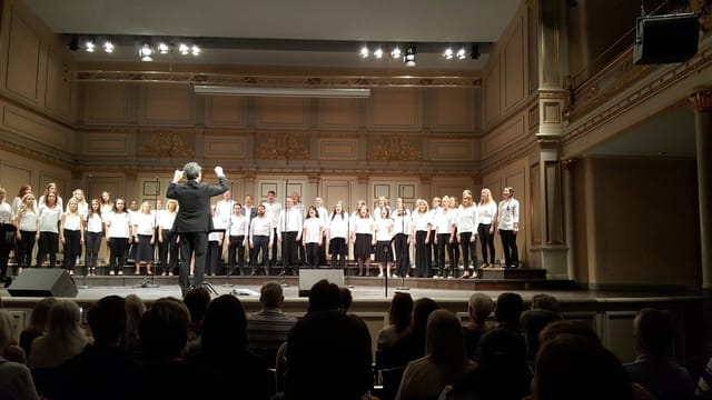 Kör choir performance at Musikaliska, showcasing acoustics and audience engagement.