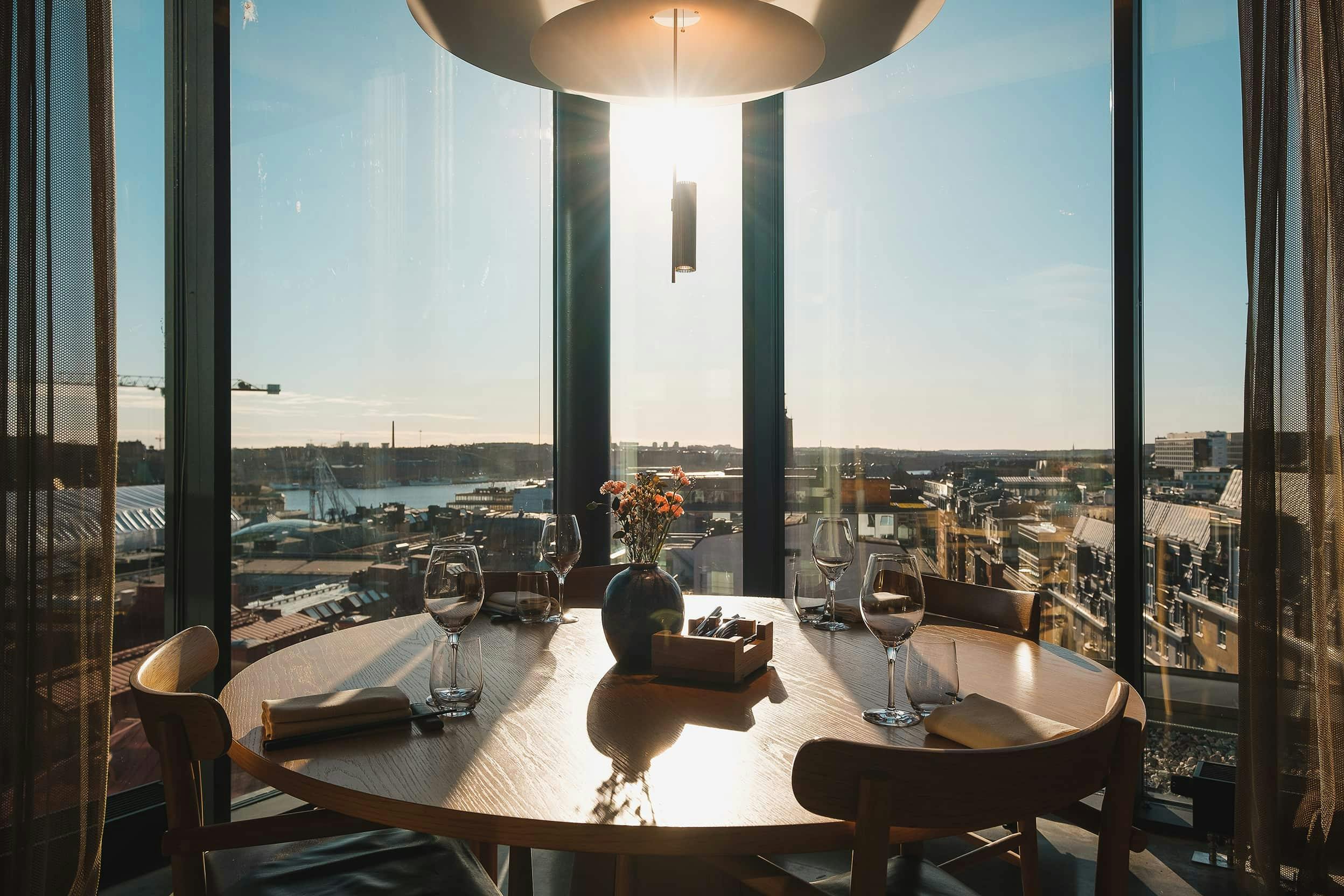 Elegant dining table with a view at Hobo Hotel, perfect for networking events and meetings.