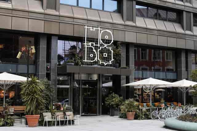 Modern Hobo Hotel lobby with outdoor seating, ideal for meetings and events.
