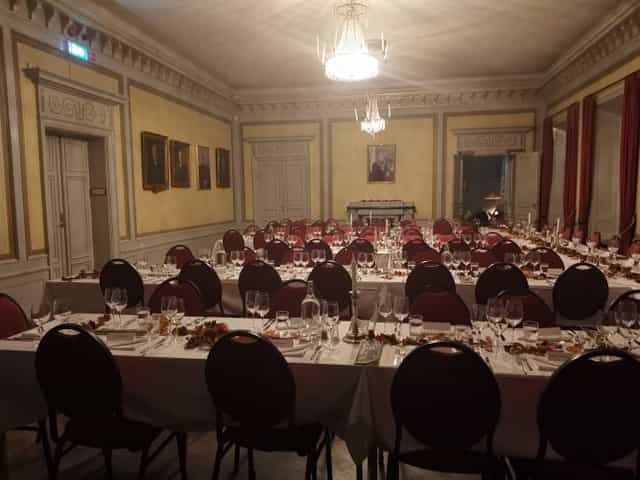 Elegant dining hall setup with polished glassware for a sophisticated gala event.