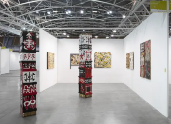 Contemporary art exhibition in Ab-Anbar Gallery with white walls and engaging layout. - Banner