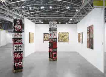 Contemporary art exhibition in Ab-Anbar Gallery with white walls and engaging layout.
