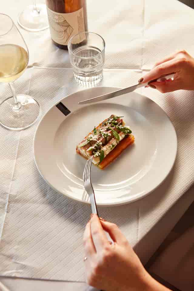 Elegant dish presentation at Lasdun Restaurant for memorable catering events.
