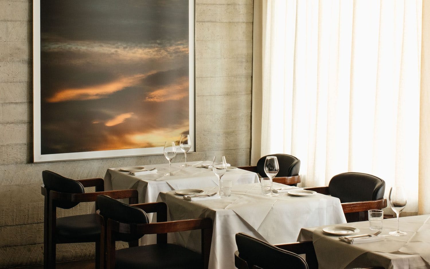Elegant dining setup in Lasdun Restaurant for corporate dinners and private events.