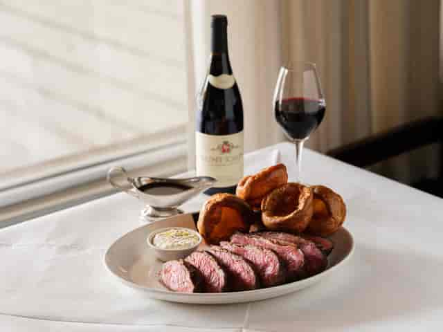Elegant roast beef dinner with Yorkshire puddings for upscale events in Lasdun Restaurant.