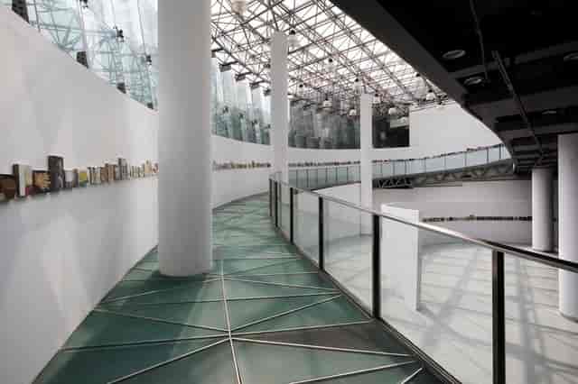Modern MoCA Pavilion with glass ceiling, ideal for events and exhibitions.