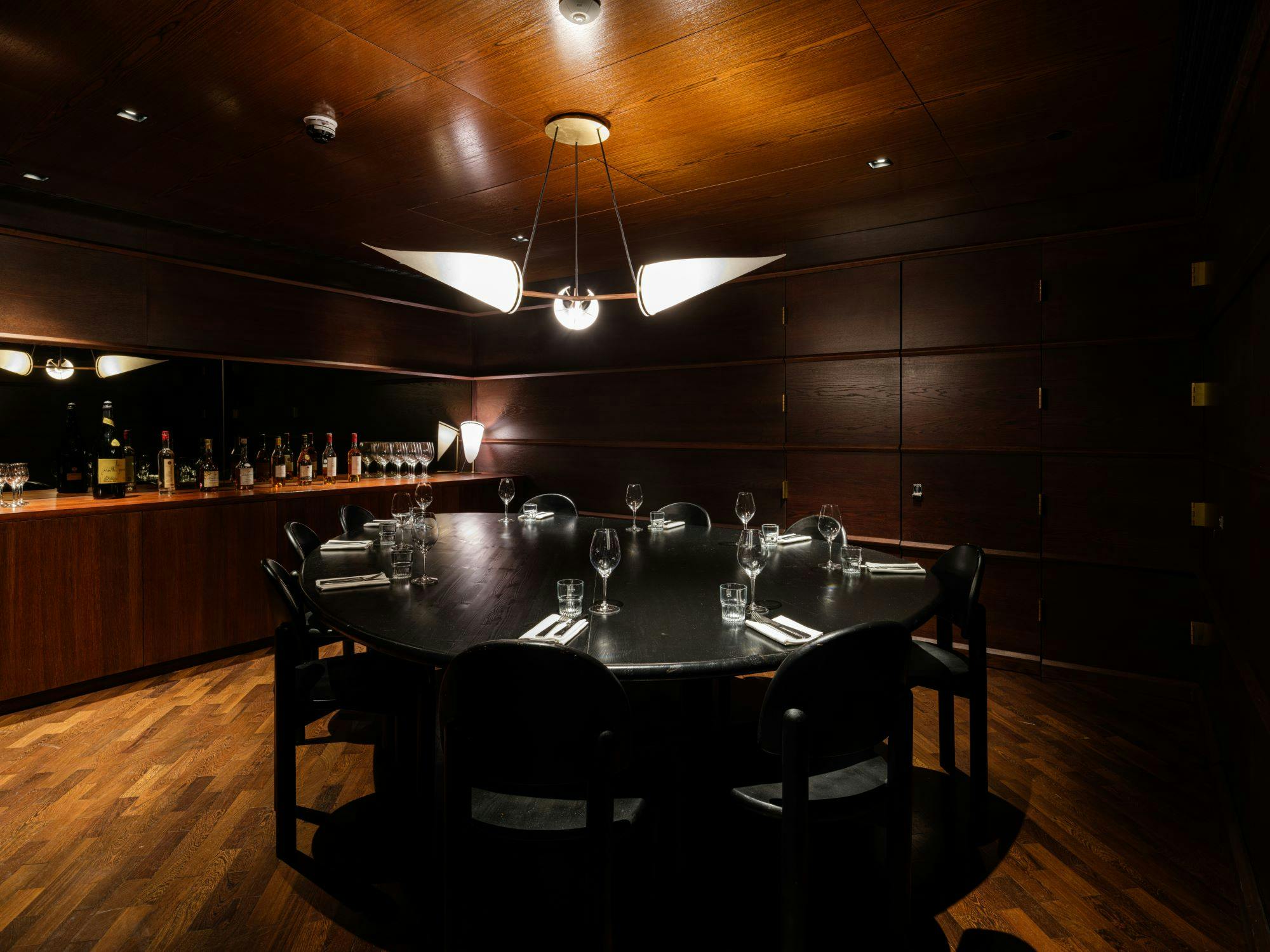 Private dining room at Lasdun Restaurant with round table for executive meetings.