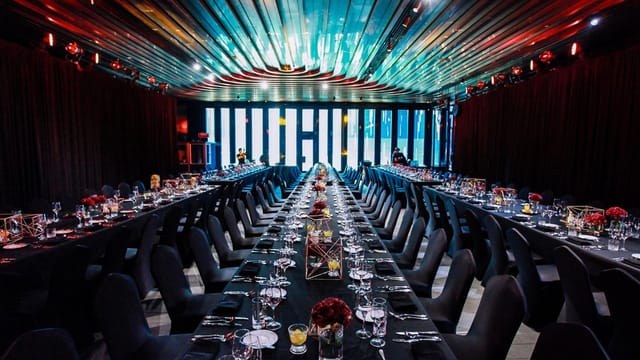 Elegant conference center in Fosun Foundation Shanghai set for formal dinner event.