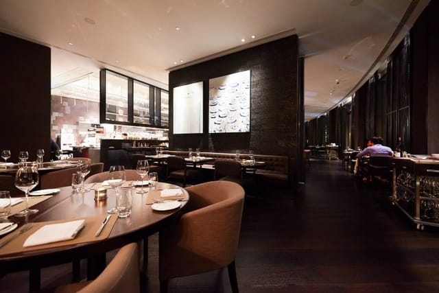 Café Gray Deluxe dining space with modern decor for corporate events and private gatherings.