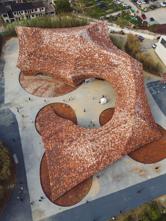 Art gallery at UCCA Center, featuring unique organic design for events and exhibitions.