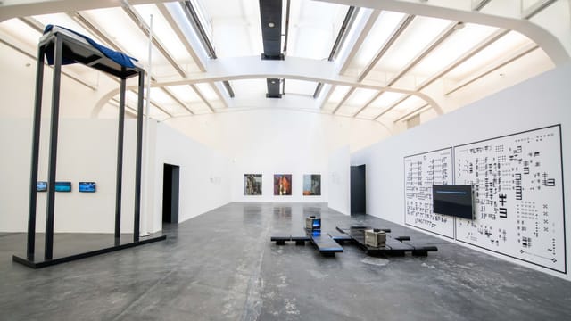 Art gallery at UCCA Center, spacious venue with high ceilings for exhibitions and events.