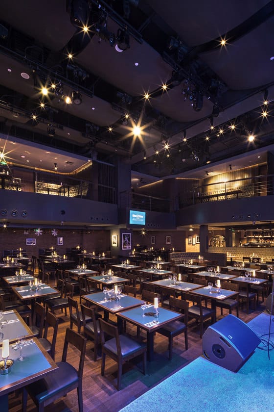 Jazz club event space in Blue Note China with stylish decor, ideal for corporate gatherings.