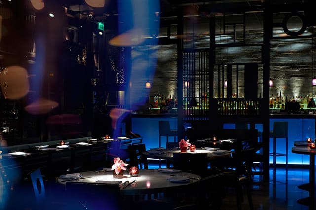 Cage at Hakkasan Shanghai: elegant dining space for corporate events and gatherings.