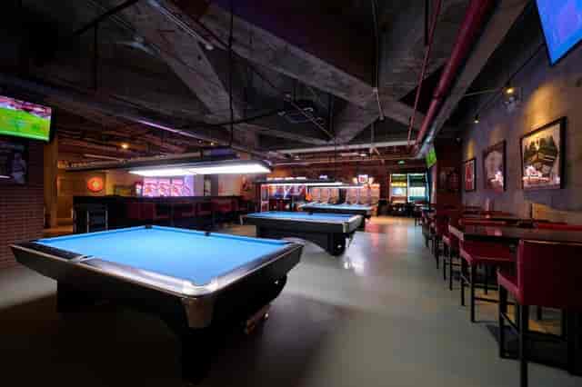 Vibrant Jing'an Event Space with pool tables for casual networking and team-building events.