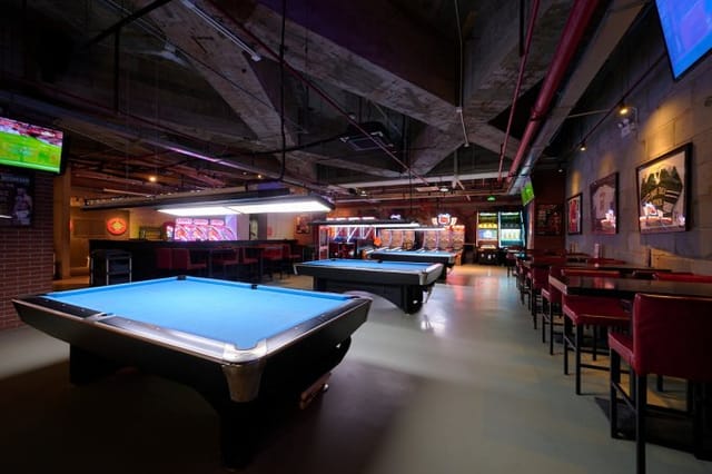 Vibrant Jing'an Event Space with pool tables for casual networking and team-building events.