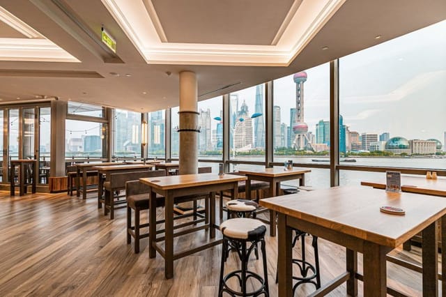 Modern event space with skyline views, ideal for networking and receptions in Shanghai.