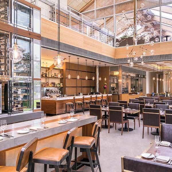 Modern Bella Napoli restaurant with stylish seating, perfect for events and meetings.