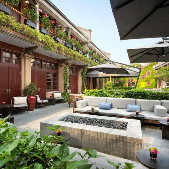 Outdoor lounge in D.O.C Shanghai with modern seating, ideal for networking events.