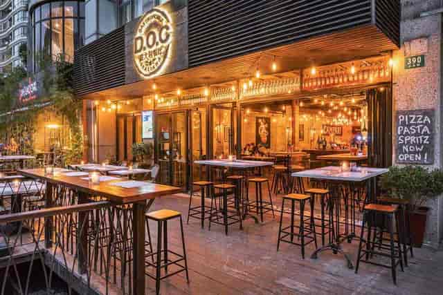 Vibrant outdoor dining space in D.O.C Shanghai, ideal for casual events and networking.