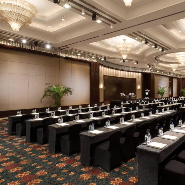 W Hotels conference room setup with elegant lighting for corporate meetings and seminars.