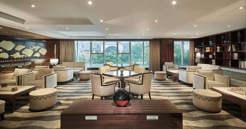 Sophisticated lounge at Hilton Shanghai Hongqiao for networking events and meetings.