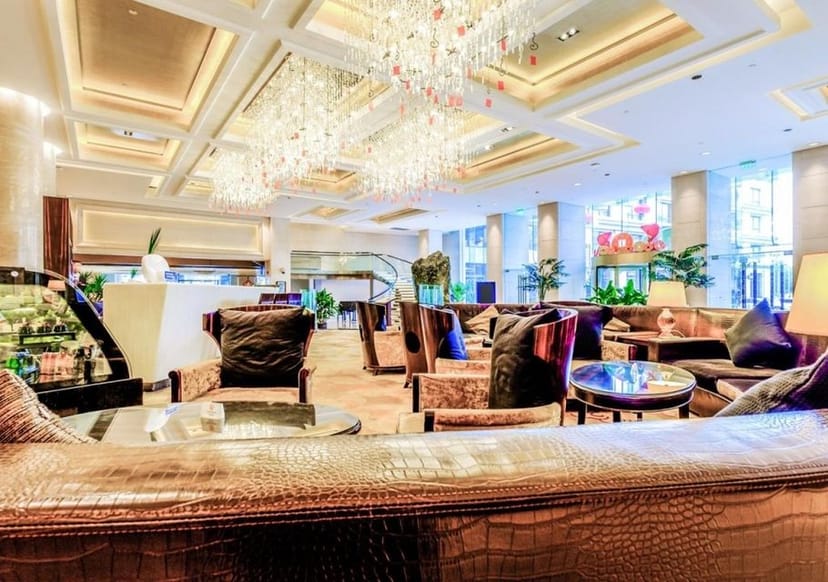 Elegant lobby at Radisson Blu Shanghai for networking and casual meetings.