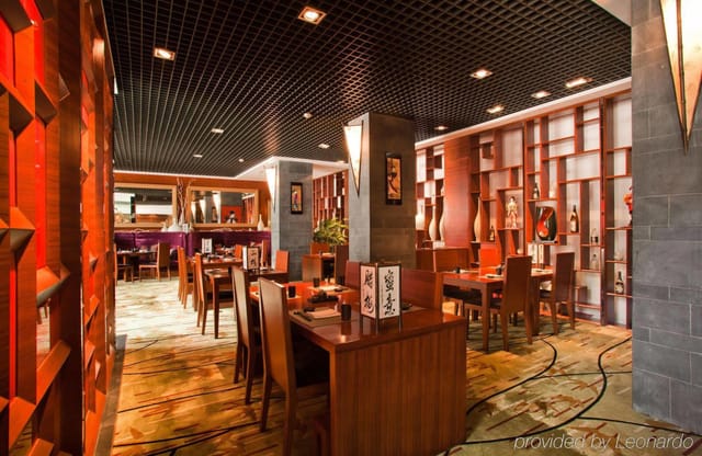 Modern restaurant in Radisson Blu Shanghai, ideal for corporate events and gatherings.