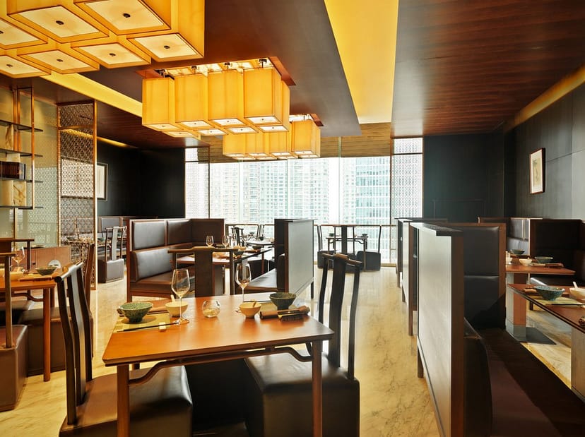 Modern dining space at Jumeirah Himalayas Hotel, perfect for business meetings and events.