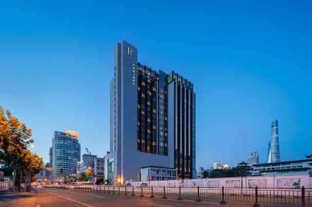 Modern hotel venue with sleek architecture, perfect for corporate events in Shanghai.