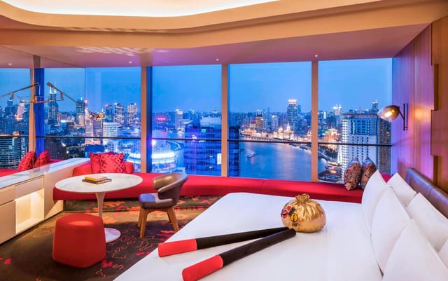 Stylish W Shanghai hotel room with panoramic views for VIP events and meetings.