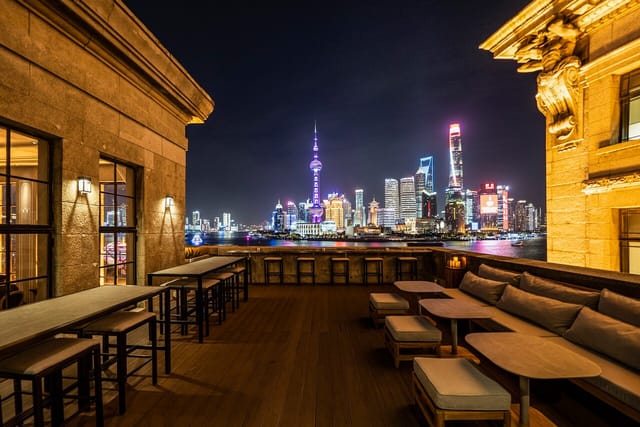 Rooftop dining area at Mr & Mrs Bund, Shanghai, ideal for upscale events and gala dinners.