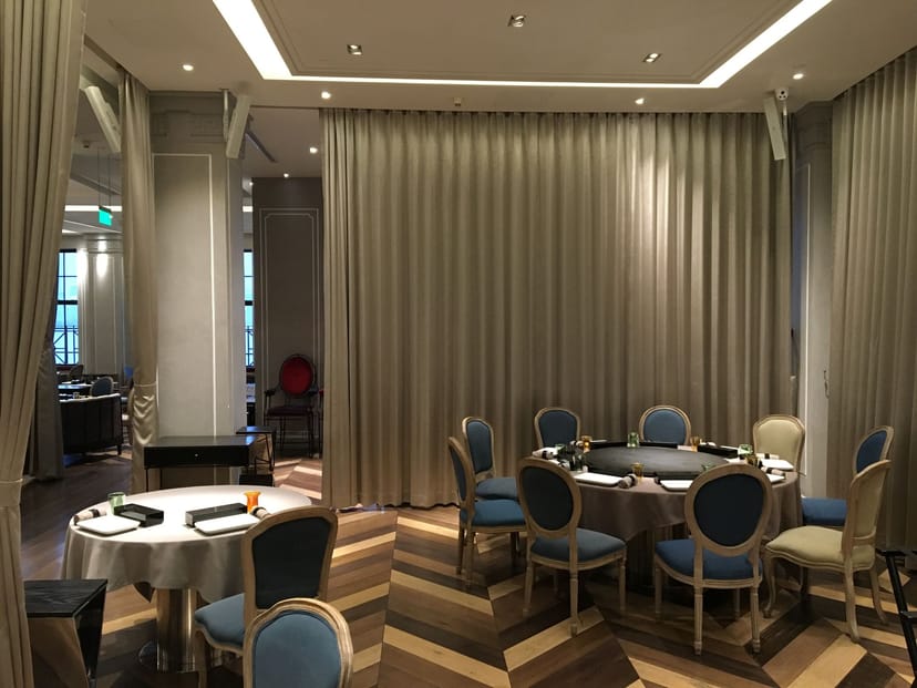 Private dining room with round table, ideal for meetings and events at Mr & Mrs Bund.